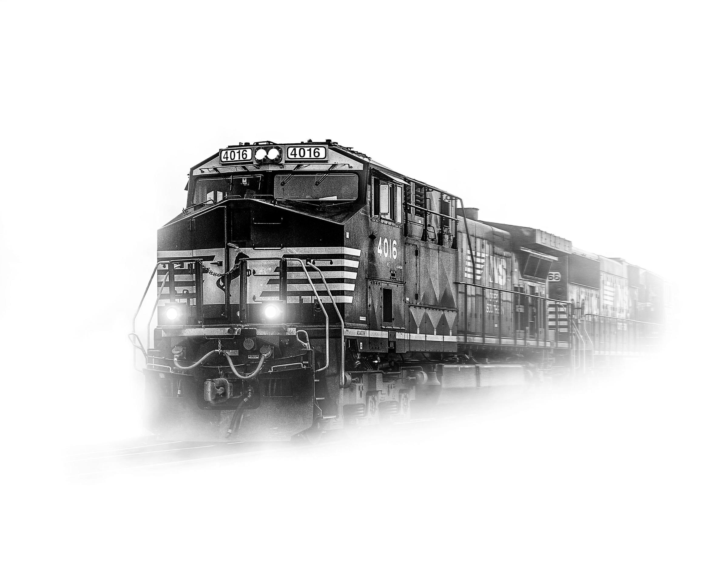 Diesel locomotive coming out of the fog