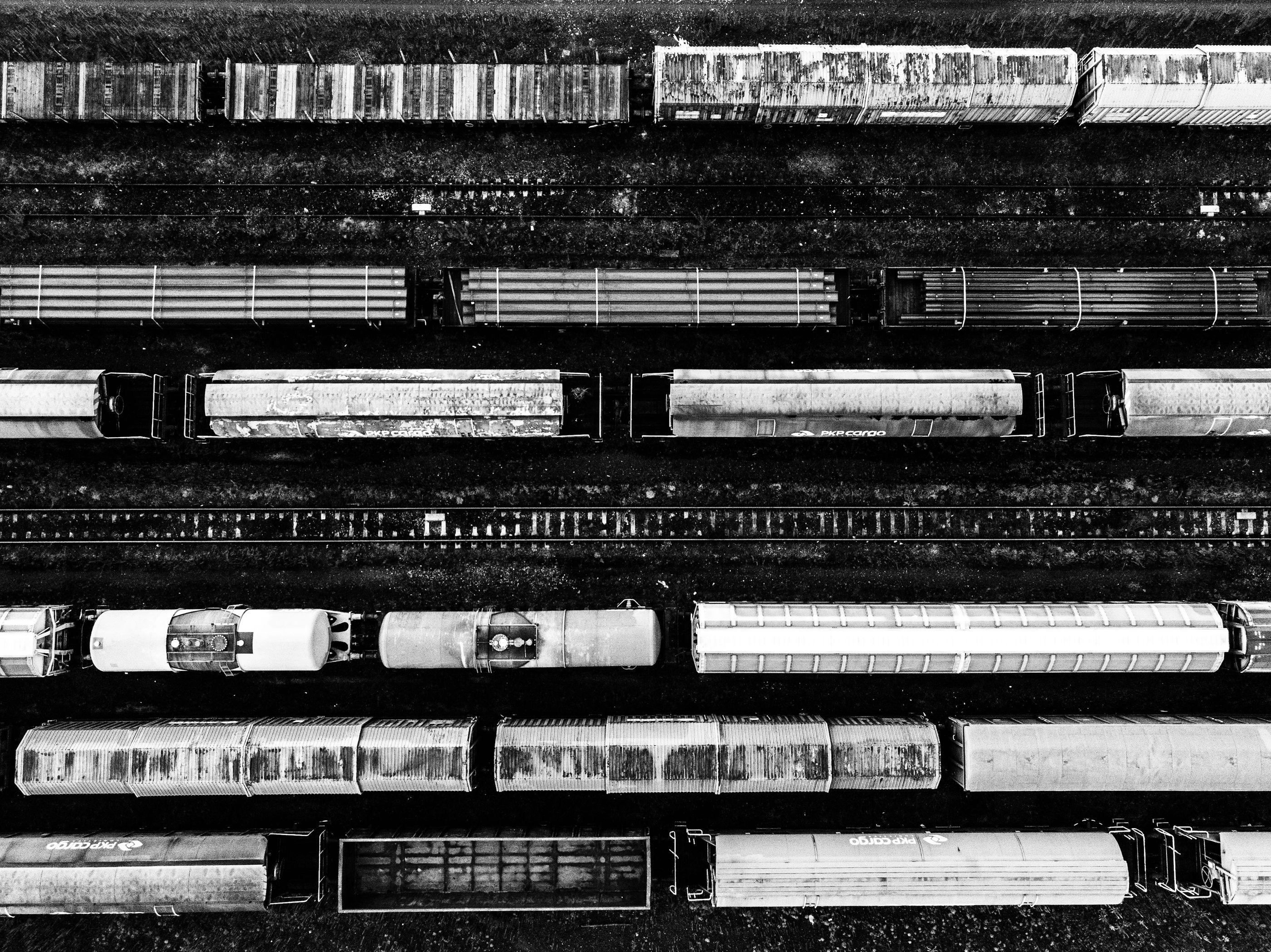 Freight trains in a rail yard, seen from directly above