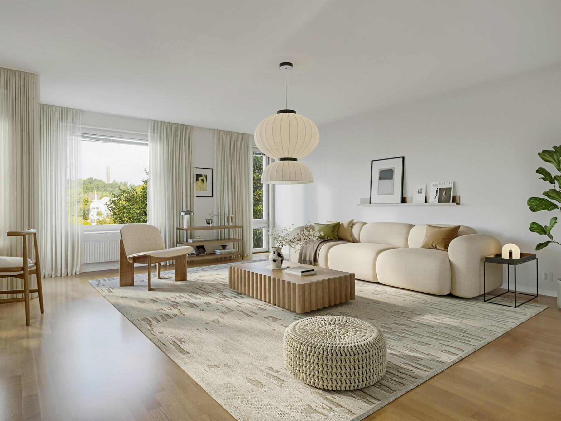 Bright living room with cream sofa and oak floor
